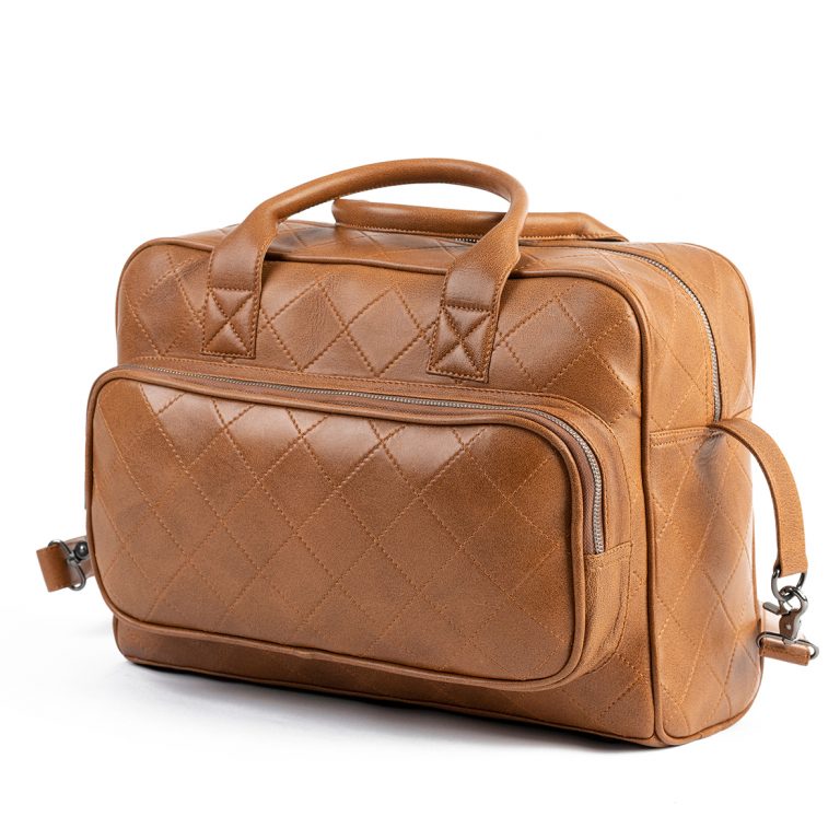 Cognac lambskin diaper bag with diamond pattern